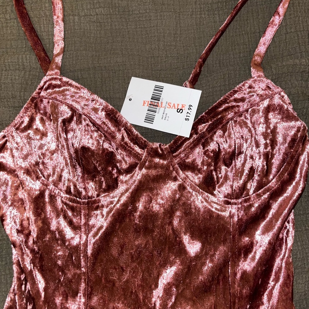 Small corset styled bodysuit from Forever 21. Tag still attached.